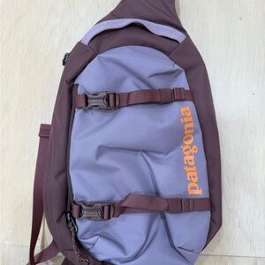 NWOT Patagonia 8L Atom crossbody sling Purple/Mauve never used!